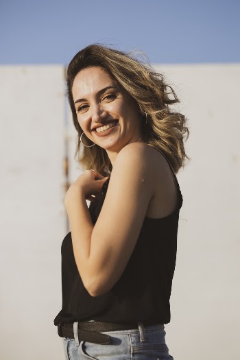 Photo Of Woman Wearing Black Tank Top