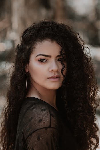 Photo of Woman Wearing Black Top