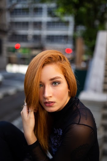 Photo of Woman Wearing Black Top