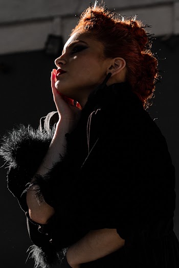 Photo Of Woman Wearing Black Top