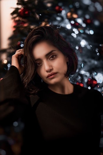 Photo of Woman Wearing Black Top