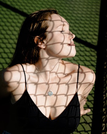 Photo Of Woman Wearing Black Top 