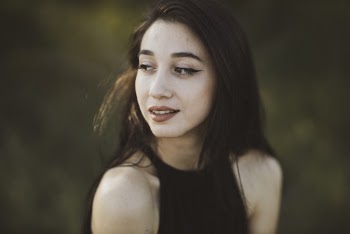 Photo Of Woman Wearing Black Top