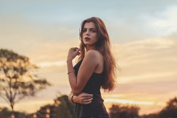 Photo Of Woman Wearing Black Top