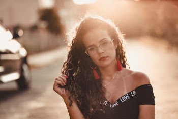 Photo of Woman Wearing Black Top