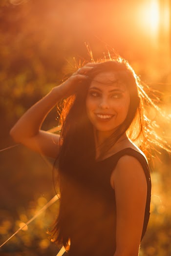 Photo Of Woman Wearing Black Top
