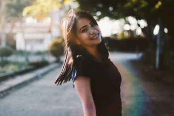 Photo Of Woman Wearing Black Top