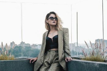 Photo of Woman Wearing Blazer