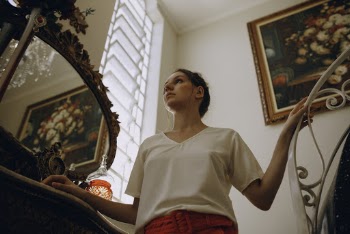 Photo of Woman Wearing Blouse