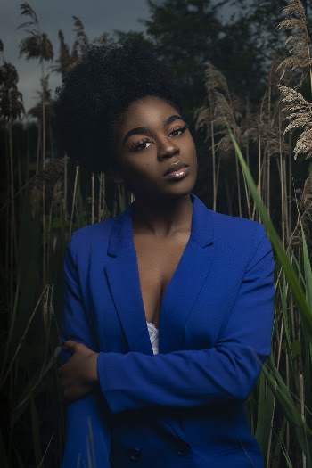 Photo Of Woman Wearing Blue Blazer 