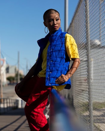 Photo Of Woman Wearing Blue Bubble Jacket