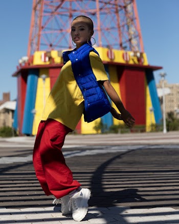 Photo Of Woman Wearing Blue Bubble Jacket