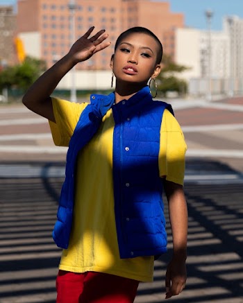 Photo Of Woman Wearing Blue Bubble Jacket