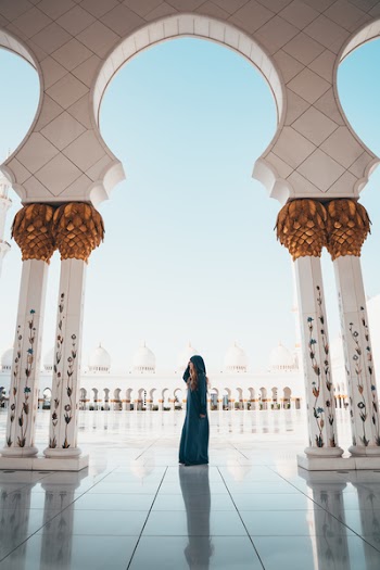 Photo of Woman Wearing Blue Coat