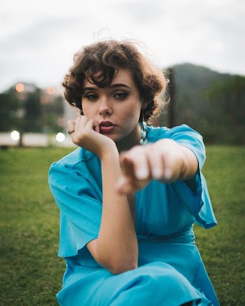 Photo of Woman Wearing Blue Dress