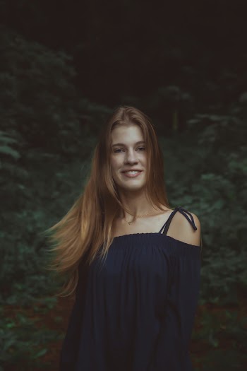Photo of Woman Wearing Blue Dress