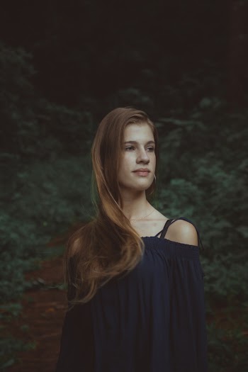 Photo of Woman Wearing Blue Dress