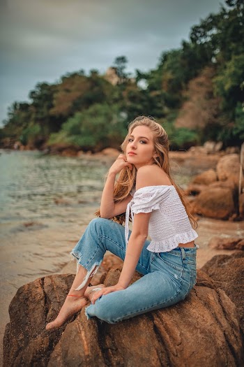 Photo of Woman Wearing Blue Jeans