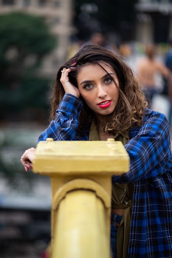 Photo of Woman Wearing Blue Plaid Shirt