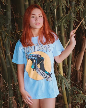Photo Of Woman Wearing Blue Shirt