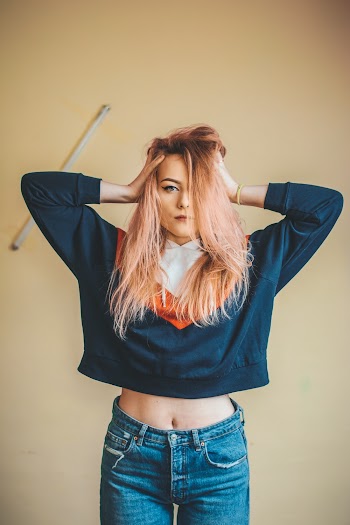 Photo Of Woman Wearing Blue Sweater