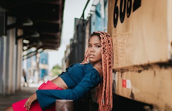 Photo Of Woman Wearing Blue Top
