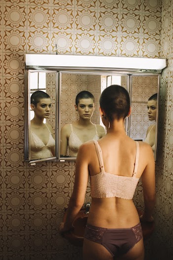 Photo of Woman Wearing Bra and Underwear