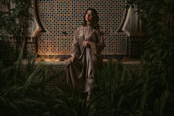 Photo Of Woman Wearing Bronze Dress