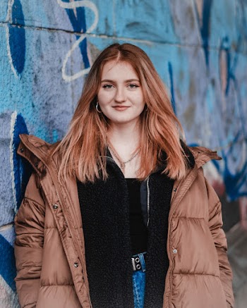Photo Of Woman Wearing Brown Bubble Jacket