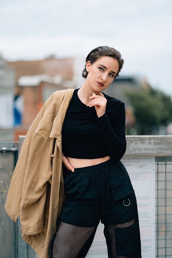 Photo of Woman Wearing Brown Coat