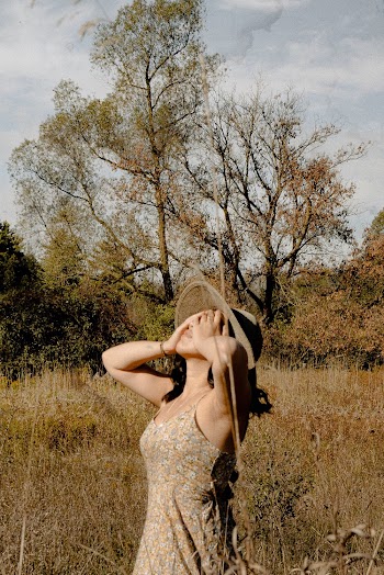 Photo Of Woman Wearing Brown Dress