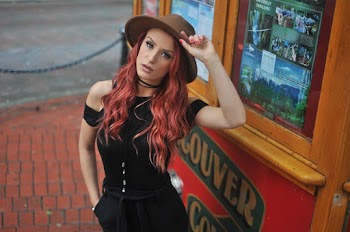 Photo of Woman Wearing Brown Fedora