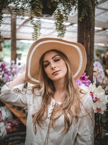 Photo Of Woman Wearing Brown Hat