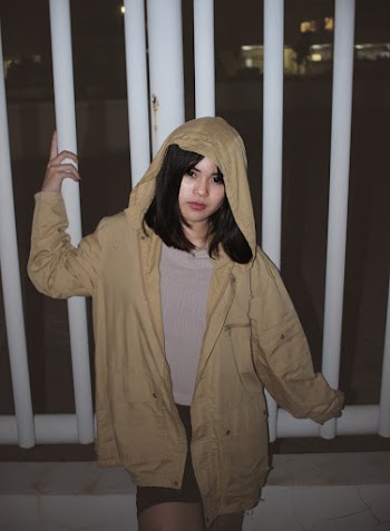 Photo of Woman Wearing Brown Jacket