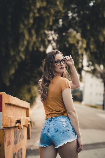 Photo Of Woman Wearing Brown Shirt