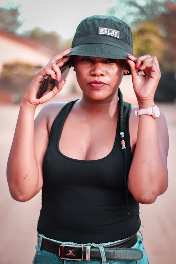 Photo Of Woman Wearing Bucket Hat