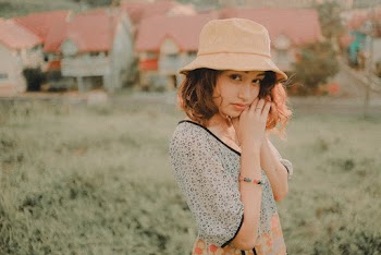 Photo Of Woman Wearing Bucket Hat