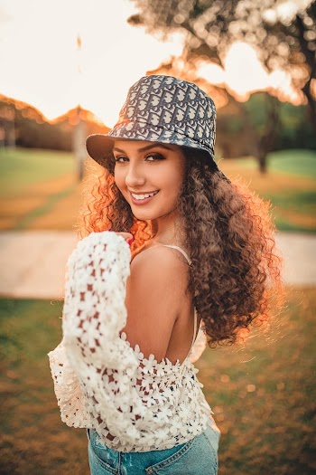 Photo of Woman Wearing Bucket Hat