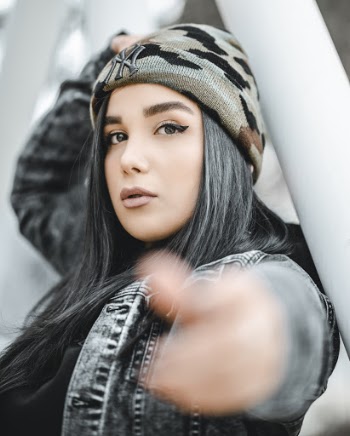 Photo Of Woman Wearing Camouflage Beanie