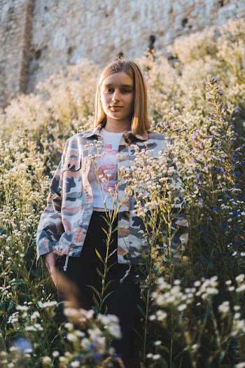 Photo Of Woman Wearing Camouflage Jacket