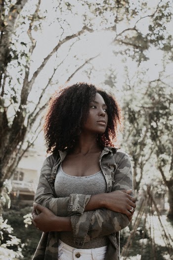 Photo Of Woman Wearing Camouflage Jacket