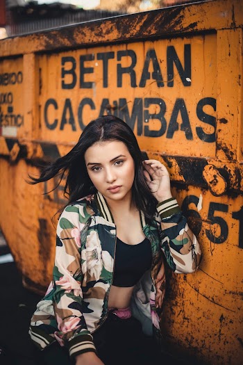 Photo of Woman Wearing Camouflage Jacket