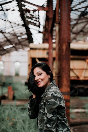 Photo of Woman Wearing Camouflage Jacket