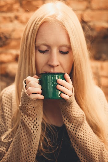 Photo of Woman Wearing Cardigan