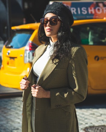 Photo Of Woman Wearing Coat