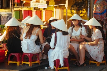 Photo Of Woman Wearing Conical Hat