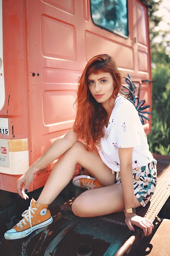 Photo of Woman Wearing Converse All-Star