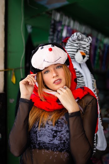 Photo of Woman Wearing Costume Hat