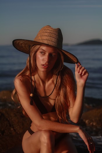 Photo of Woman Wearing Cowboy Hat