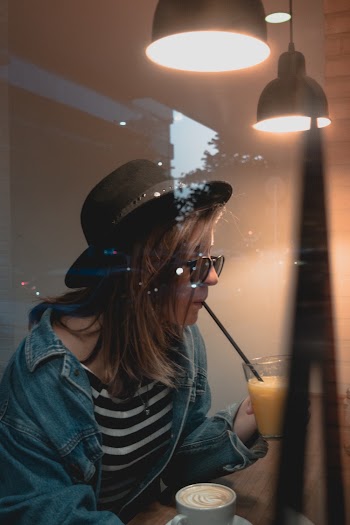 Photo of Woman Wearing Denim Jacket